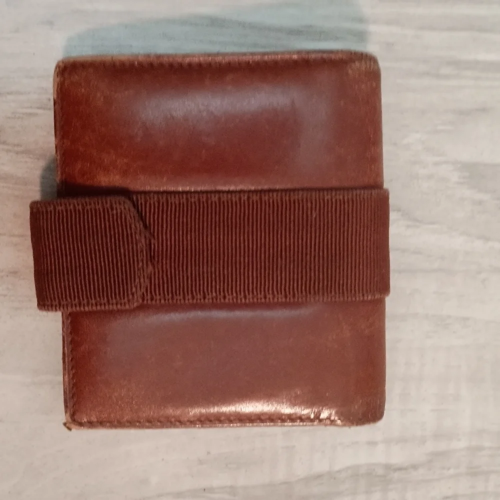 Salvatore Ferragamo Vintage Vara Bi-fold wallet Embossed leather Brown